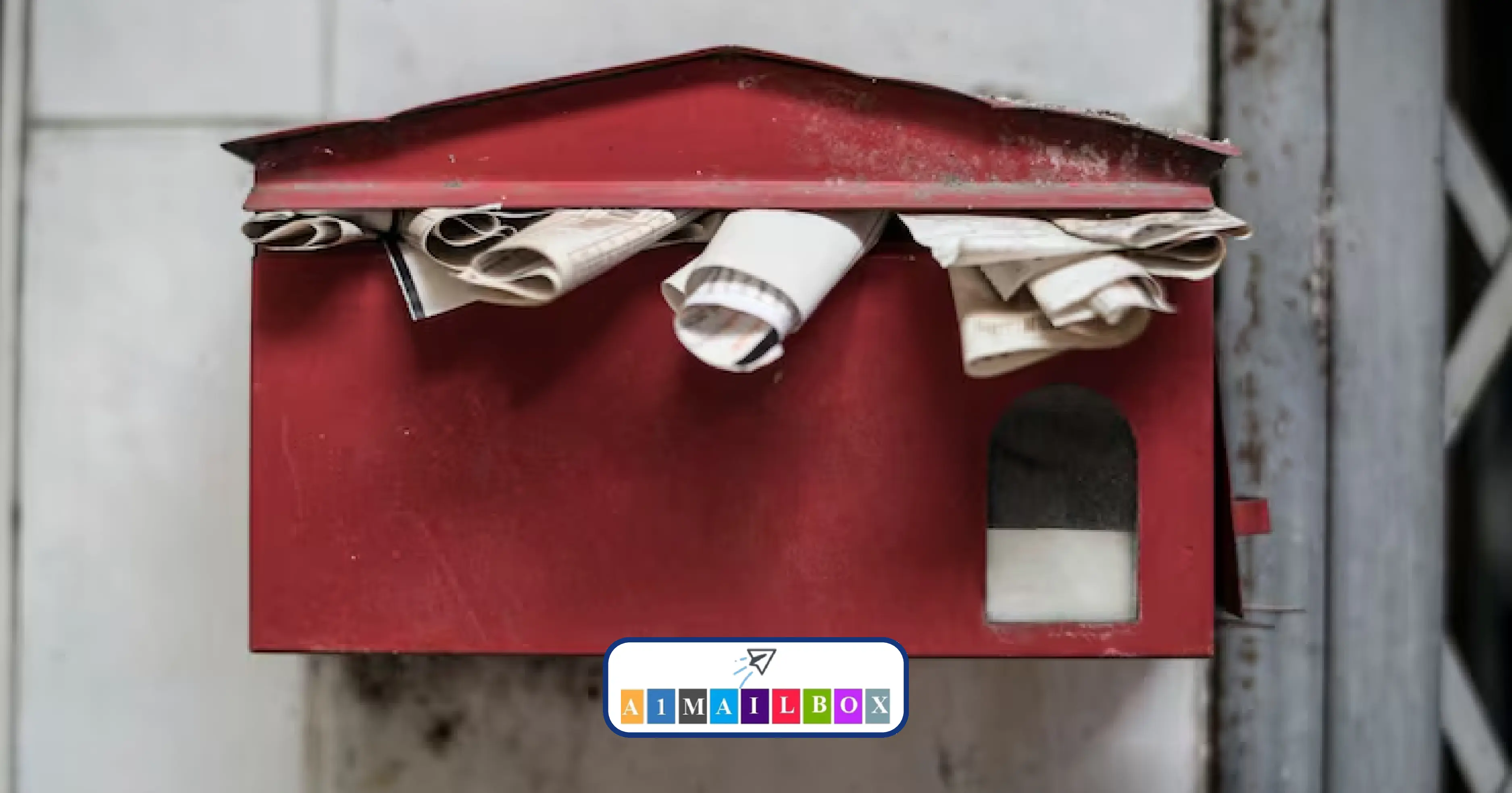 Overflowing home mailbox stuffed with paper, highlighting the risks of mail theft and missed deliveries—discover why private mailboxes are safer.
